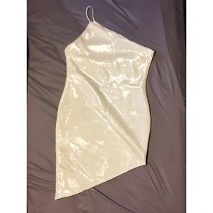 Asymmetrical , one-shoulder silver dress